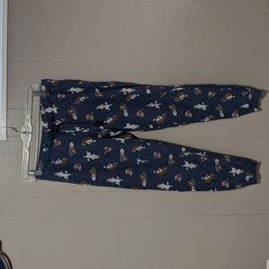 Pajama pants with sleeping dogs and drawstring waist